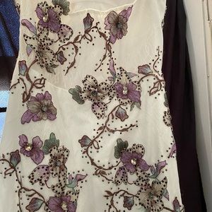 Unaltered prom dress never worn and was not able to take back after I bought it